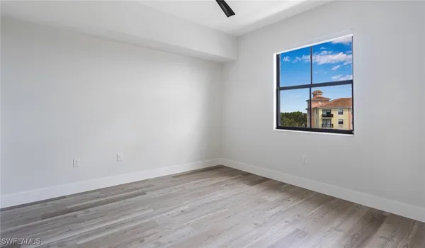 a view of small space with wooden floor