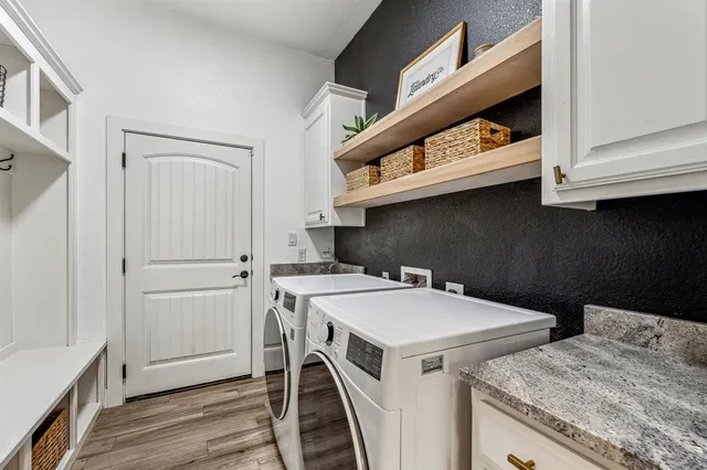 a utility room with dryer and washer