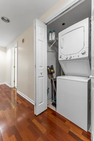 a view of a storage & utility room with wooden floor