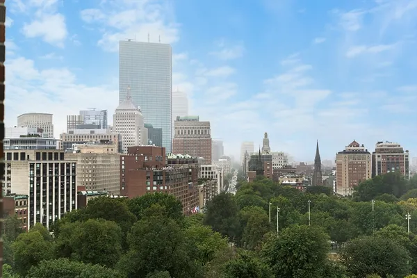 a view of a city with tall buildings