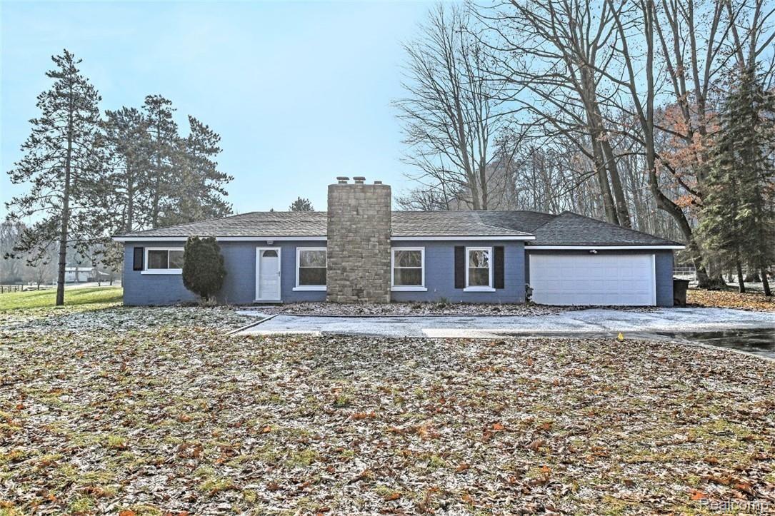 3505 Mason Road Howell, MI 48843 - Photo 26 of 28 2 car attached garage plus additional parking area in front