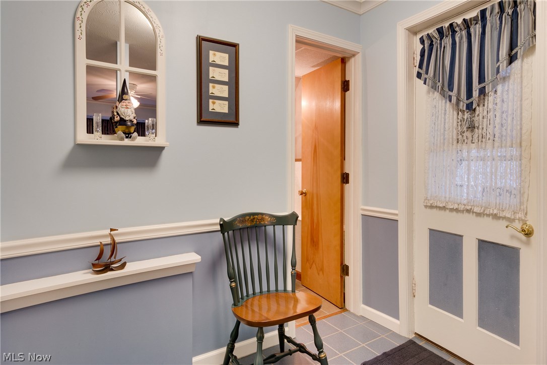 7579 Little Mountain Road Mentor, OH 44060 - Photo 26 of 33 Mudroom from side entrance with a half bath ~ adjacent to family room ~ could easily become a 4th bedroom