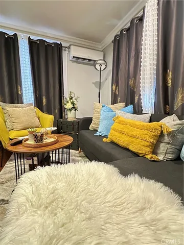 a bedroom with a bed and a table in it