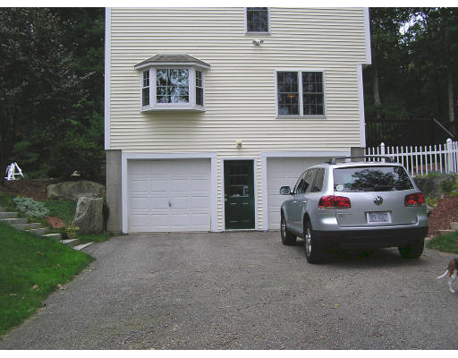 495 West Sturbridge Road East Brookfield, MA 01515 - Photo 11 of 13 a car parked in front of a house