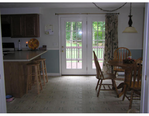 495 West Sturbridge Road East Brookfield, MA 01515 - Photo 2 of 13 a dining room with furniture and a window