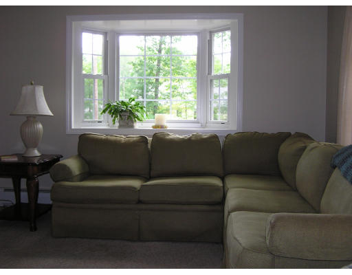495 West Sturbridge Road East Brookfield, MA 01515 - Photo 8 of 13 a living room with furniture and a window