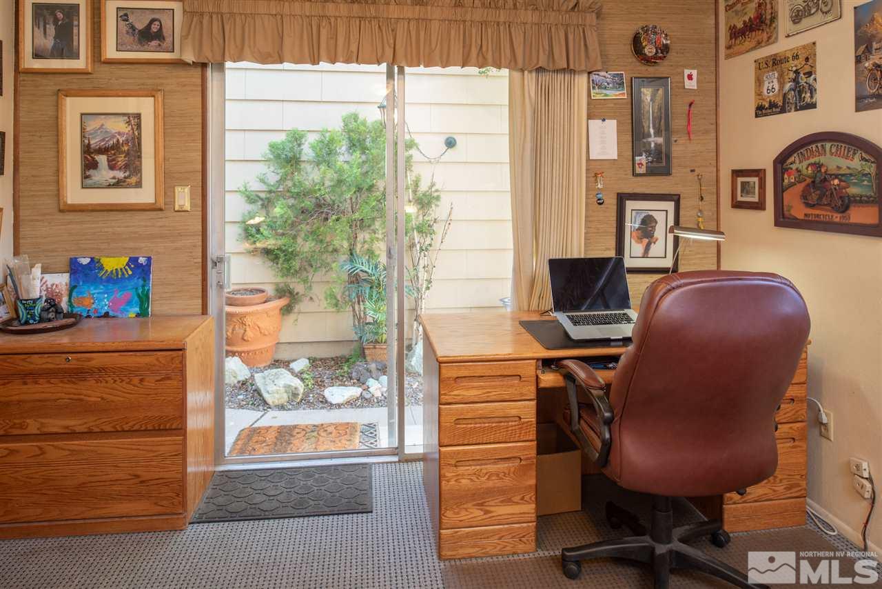 1490 O Farrell Street Reno, NV 89503 - Photo 8 of 15 a view of a workspace with furniture and a window