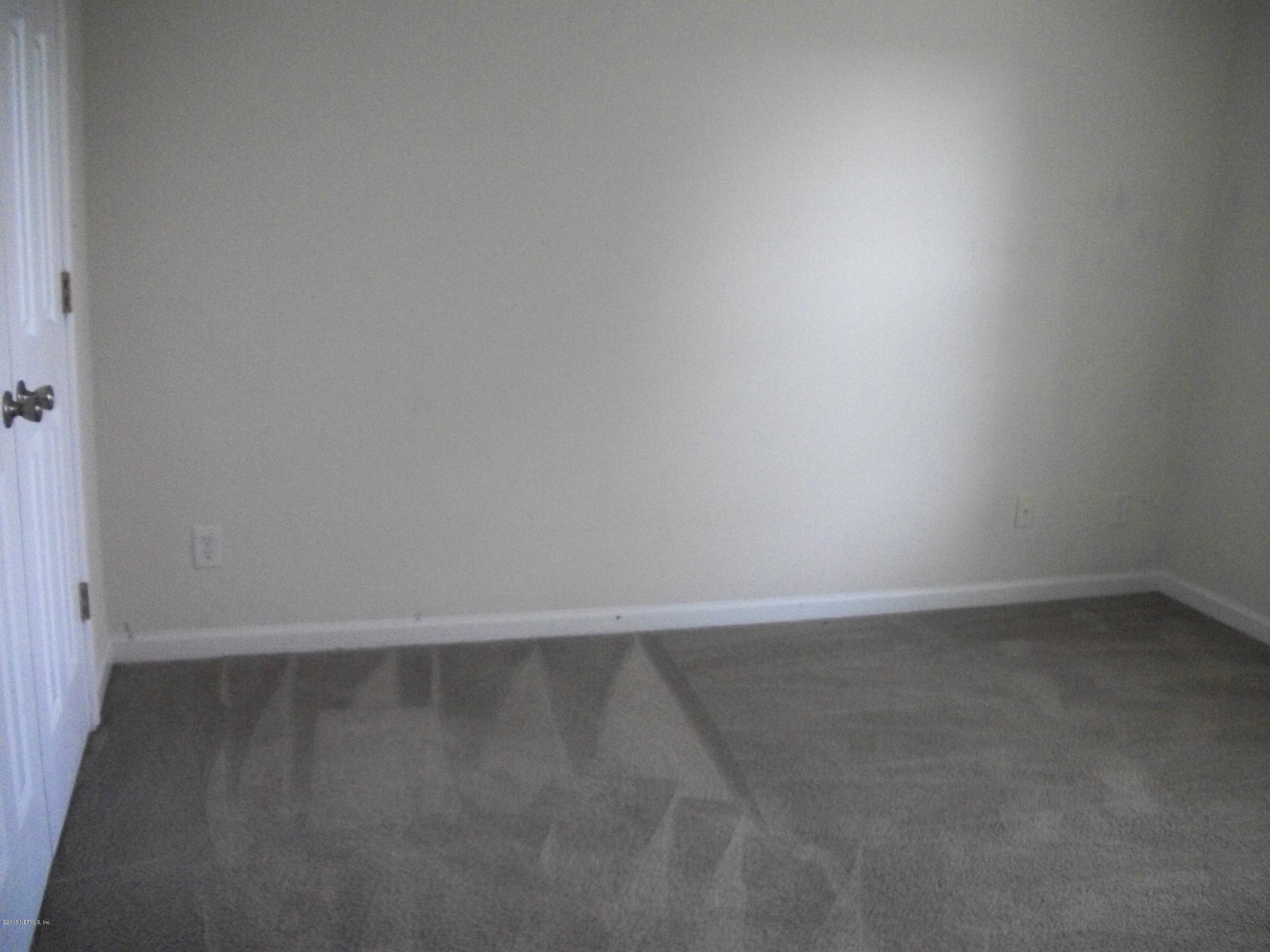 7194 Rampart Ridge Circle West Jacksonville, FL 32244 - Photo 6 of 14 a view of an empty room