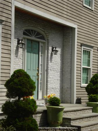798 Worcester Street Wellesley, MA 02482 - Photo 1 of 20 a view of a house with potted plants