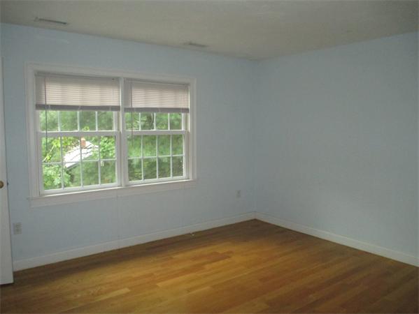 798 Worcester Street Wellesley, MA 02482 - Photo 11 of 20 an empty room with a window