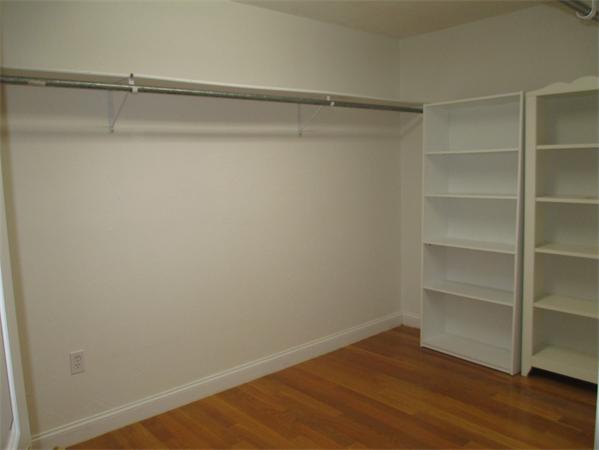 798 Worcester Street Wellesley, MA 02482 - Photo 13 of 20 a view of an empty walk in closet