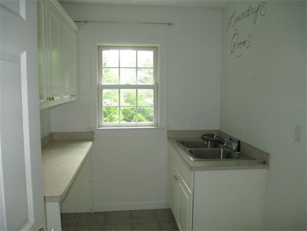 798 Worcester Street Wellesley, MA 02482 - Photo 18 of 20 a utility room with a window
