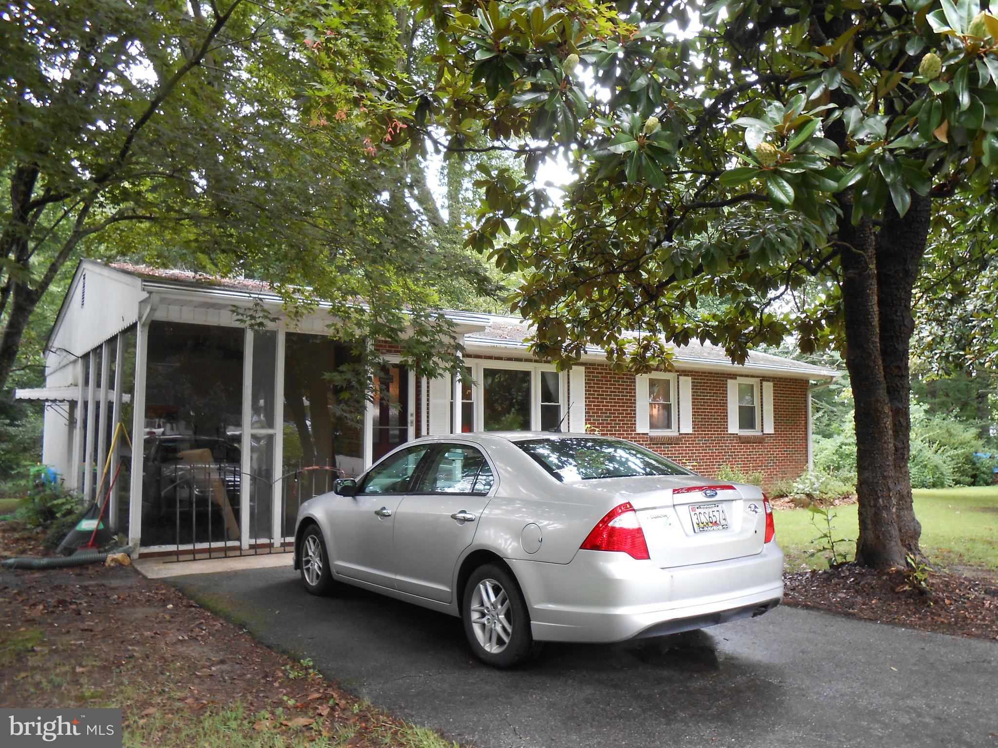 48 Robshire Manor Road Huntingtown, MD 20639 - Photo 3 of 22 Outside of sun room