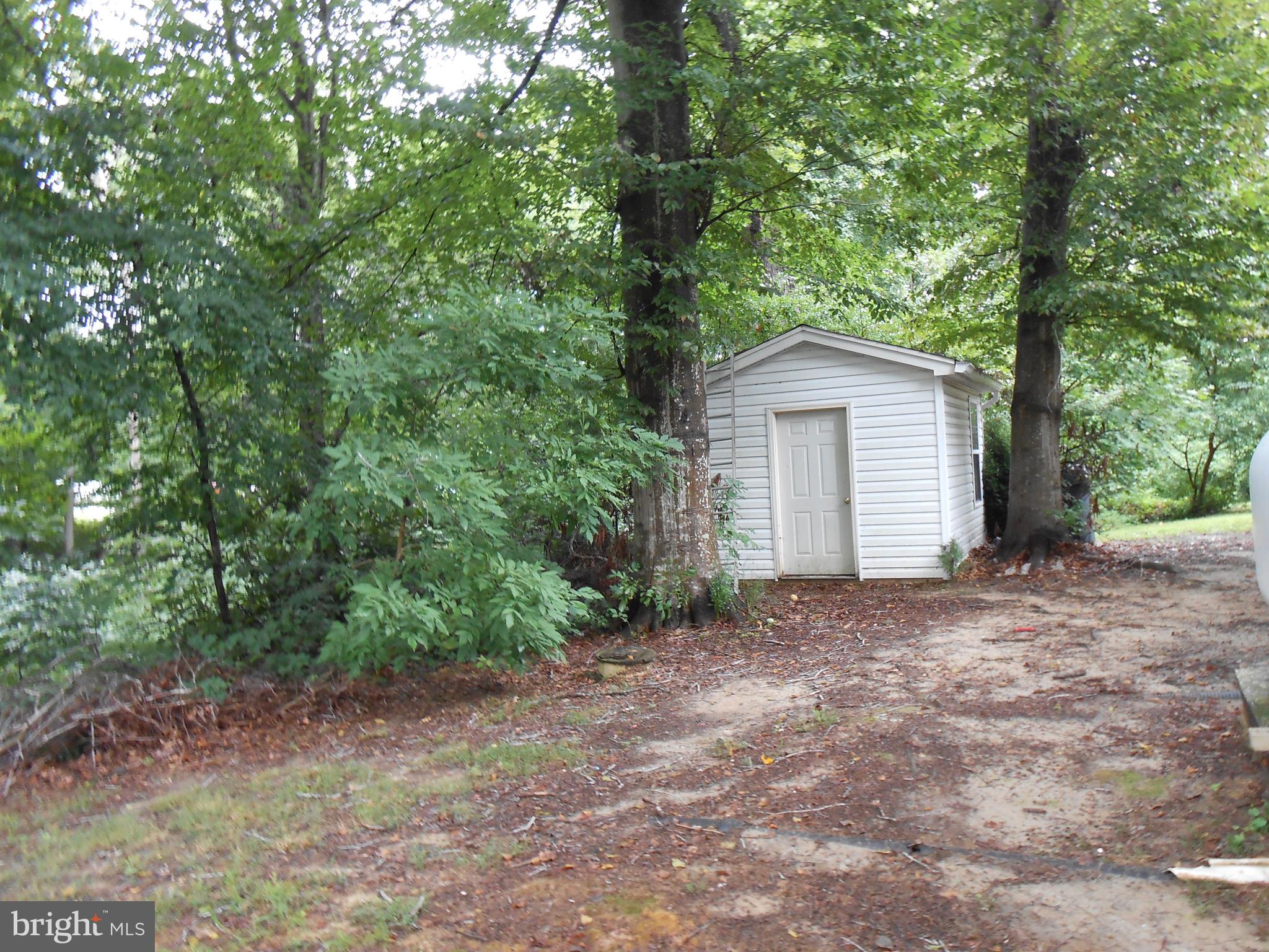 48 Robshire Manor Road Huntingtown, MD 20639 - Photo 6 of 22 Shed in back yard