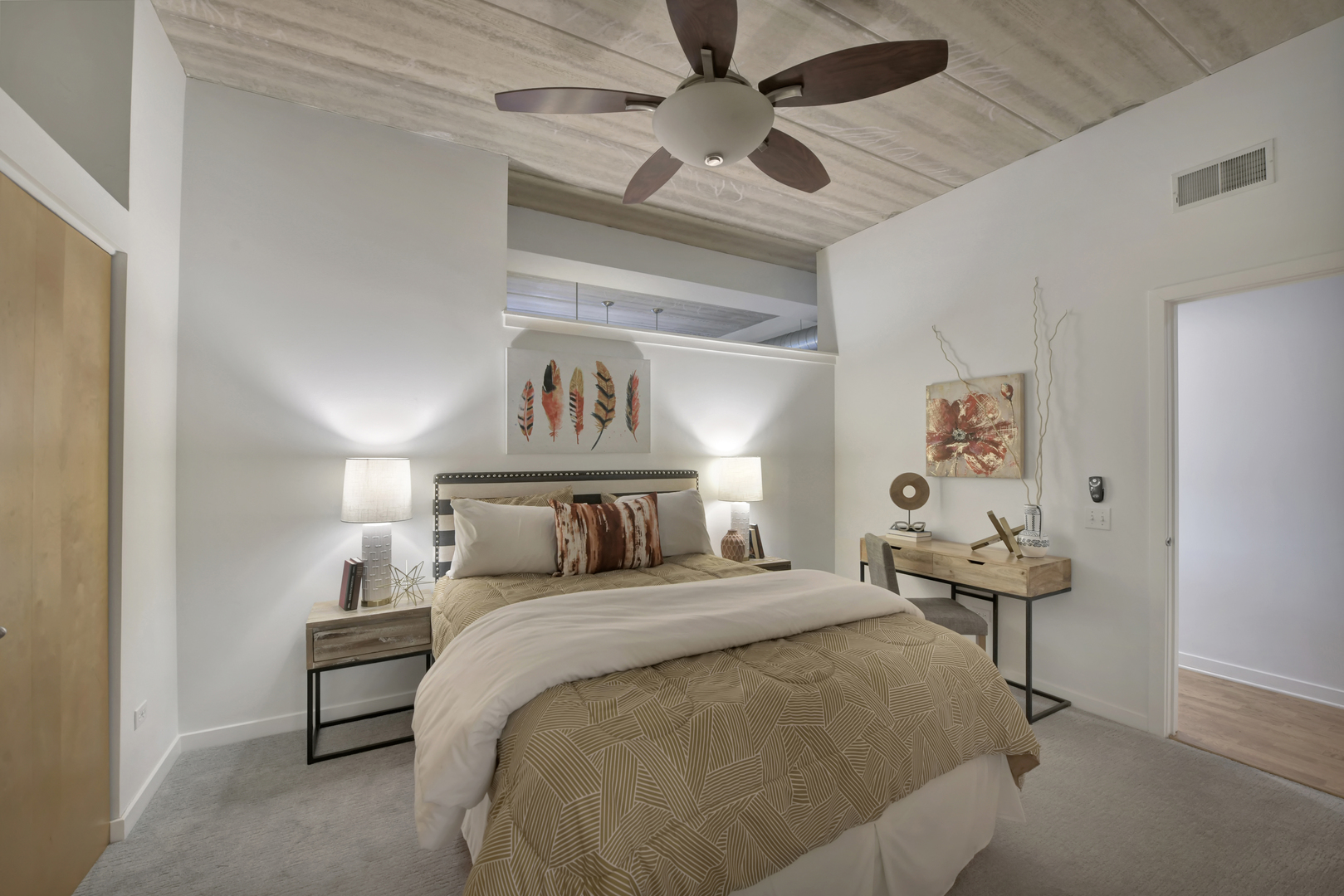3260 North Clark Street, Unit 407 Chicago, IL 60657 - Photo 11 of 18 a bed room with a bed and a chair