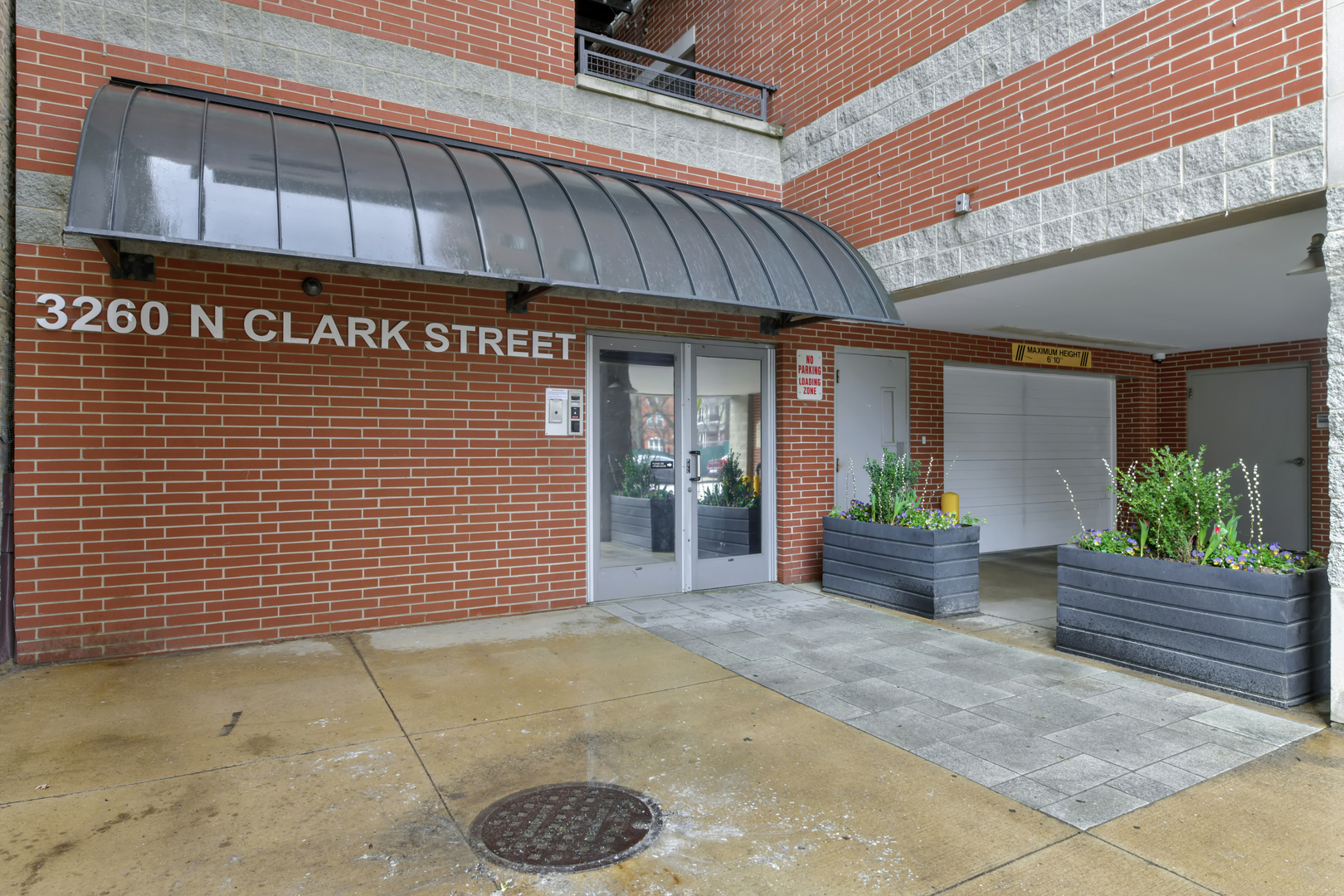 3260 North Clark Street, Unit 407 Chicago, IL 60657 - Photo 2 of 18 a view of a entrance door of the building