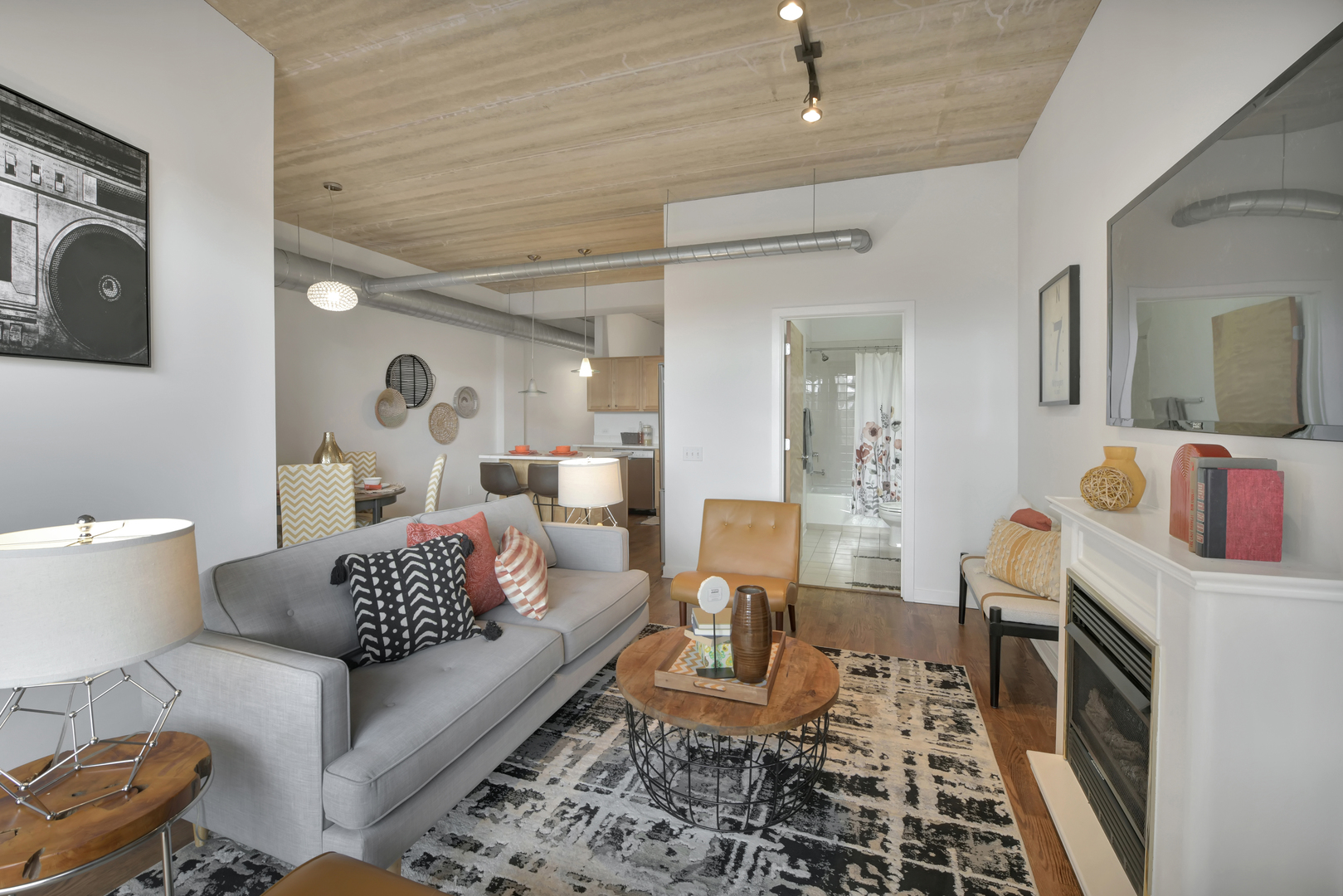 3260 North Clark Street, Unit 407 Chicago, IL 60657 - Photo 7 of 18 a living room with furniture and wooden floor