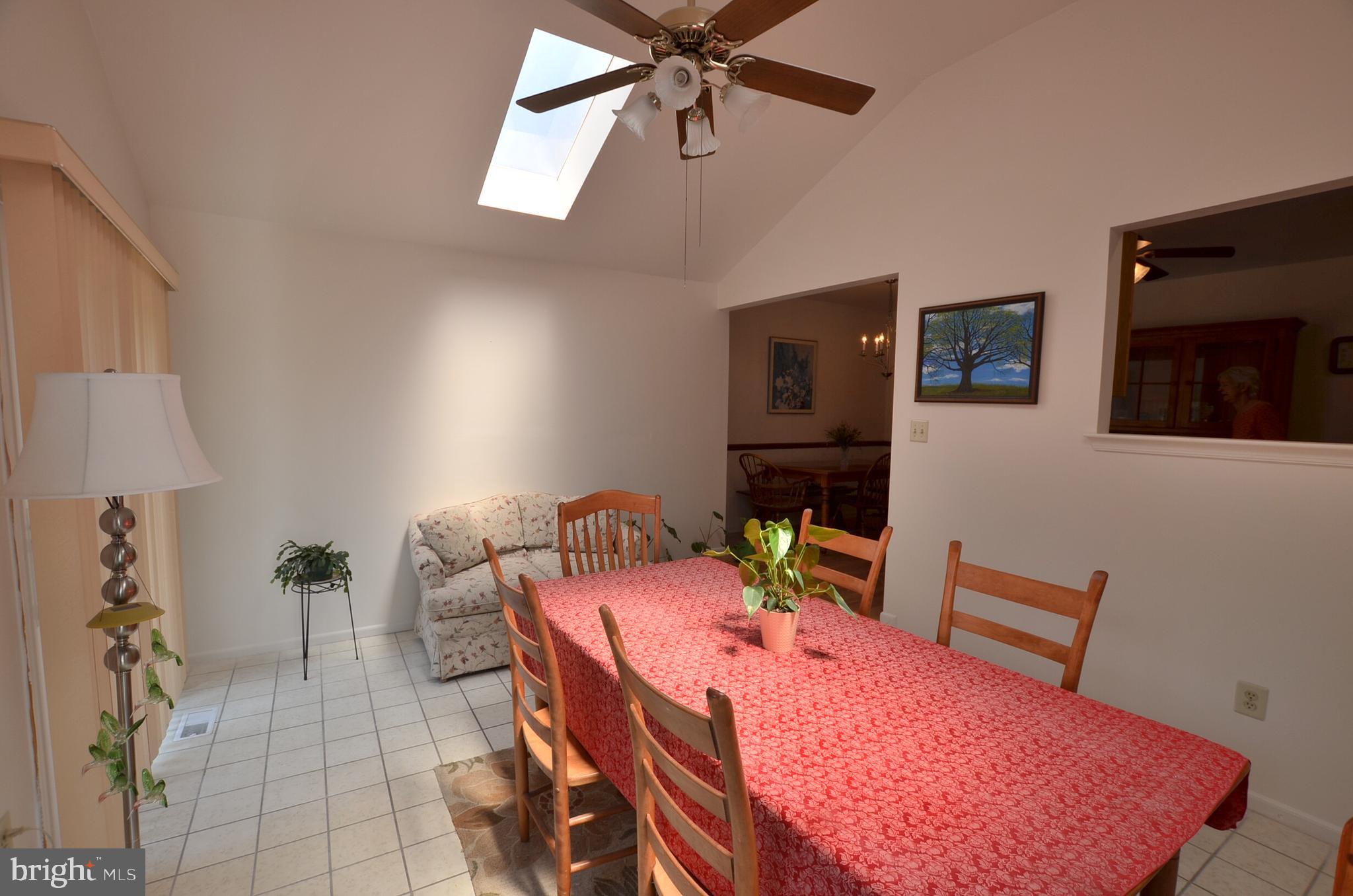 312 Scola Road Brookhaven, PA 19015 - Photo 15 of 27 Rear sunroom, ceiling fan, vaulted ceiling