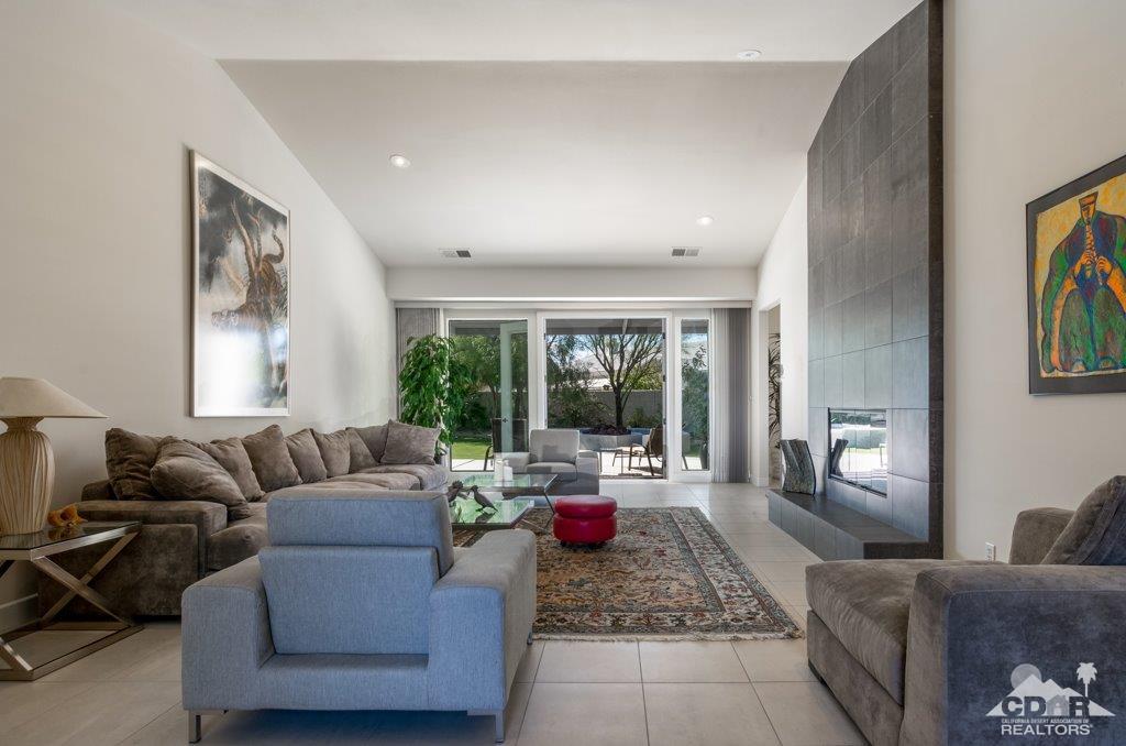 19 Napoleon Road Rancho Mirage, CA 92270 - Photo 12 of 41 a living room with furniture and a large window