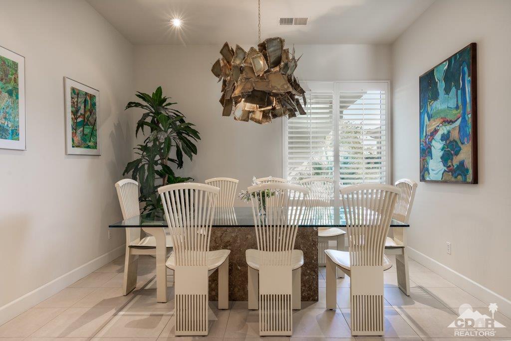 19 Napoleon Road Rancho Mirage, CA 92270 - Photo 3 of 41 a dining room with furniture and window