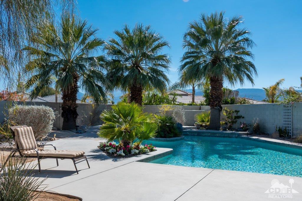 19 Napoleon Road Rancho Mirage, CA 92270 - Photo 23 of 41 a view of a backyard with a sitting area and furniture