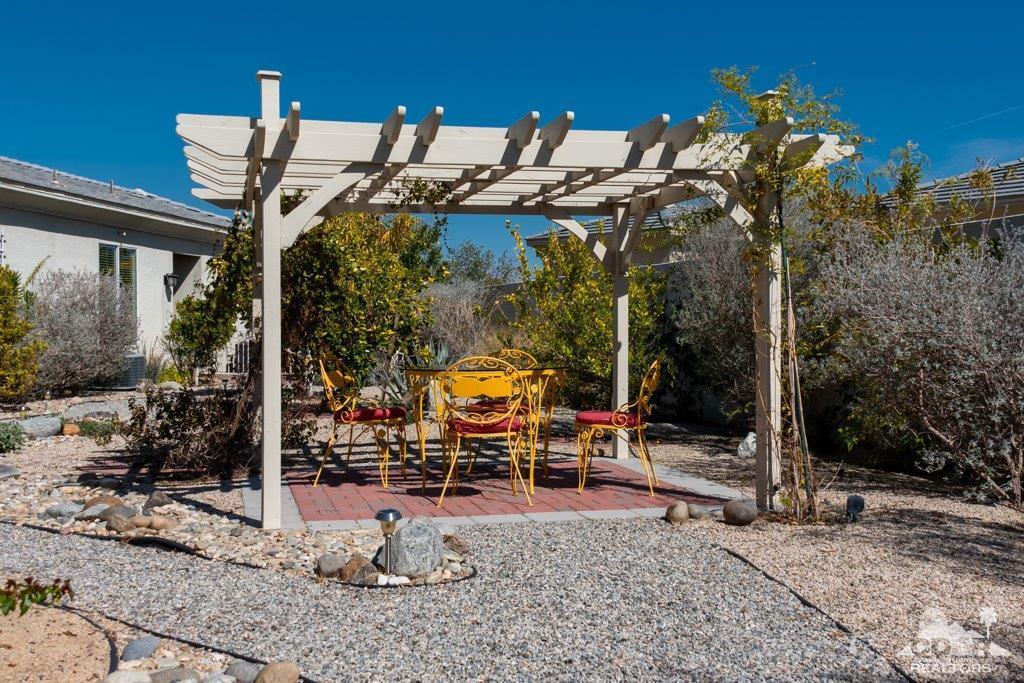 19 Napoleon Road Rancho Mirage, CA 92270 - Photo 27 of 41 a view of outdoor space with seating area