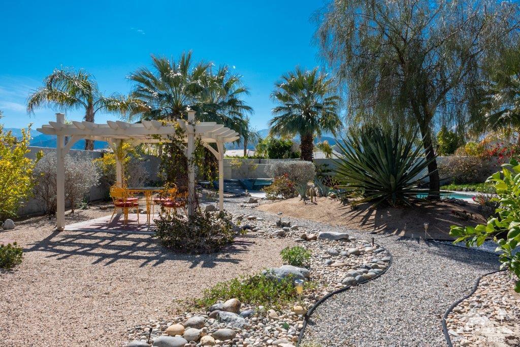 19 Napoleon Road Rancho Mirage, CA 92270 - Photo 28 of 41 a view of a backyard with a garden