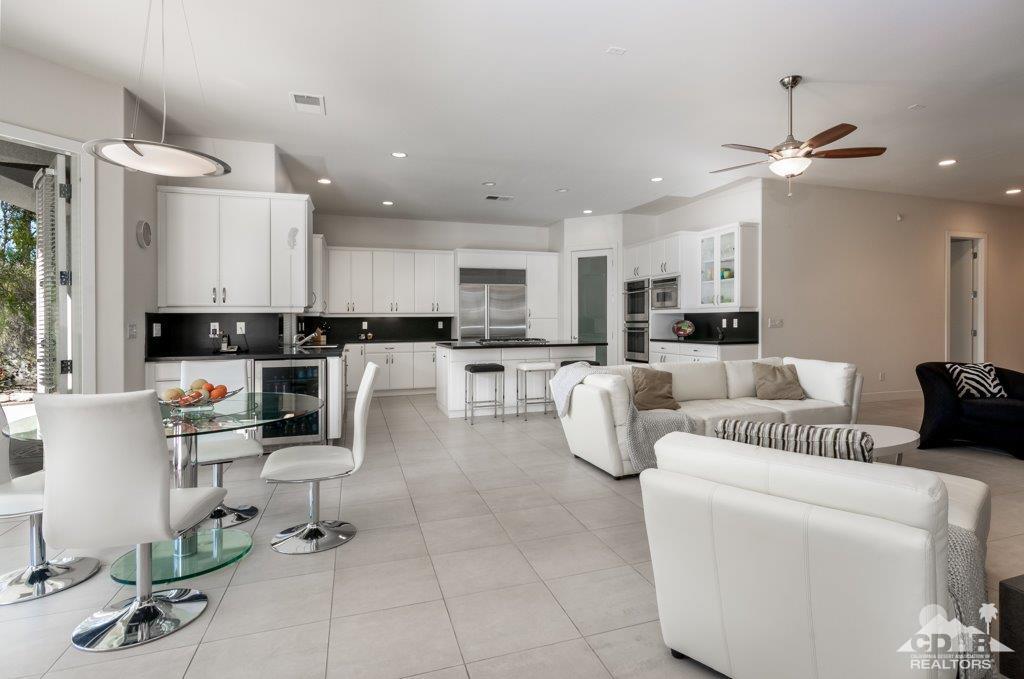 19 Napoleon Road Rancho Mirage, CA 92270 - Photo 4 of 41 a living room with furniture and kitchen view