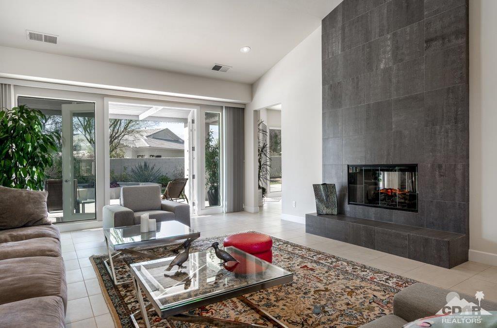 19 Napoleon Road Rancho Mirage, CA 92270 - Photo 10 of 41 a living room with furniture and a fireplace