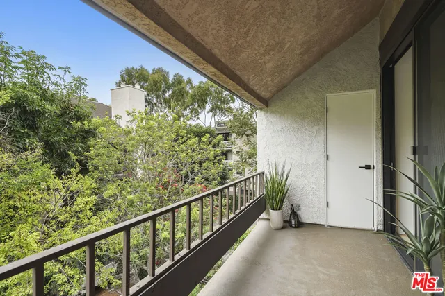 a view of a living room and dining room