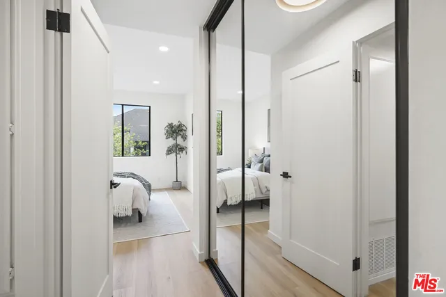 a view of a livingroom with furniture and windows