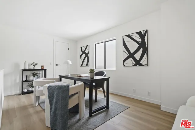 a view of a table and chairs in a room