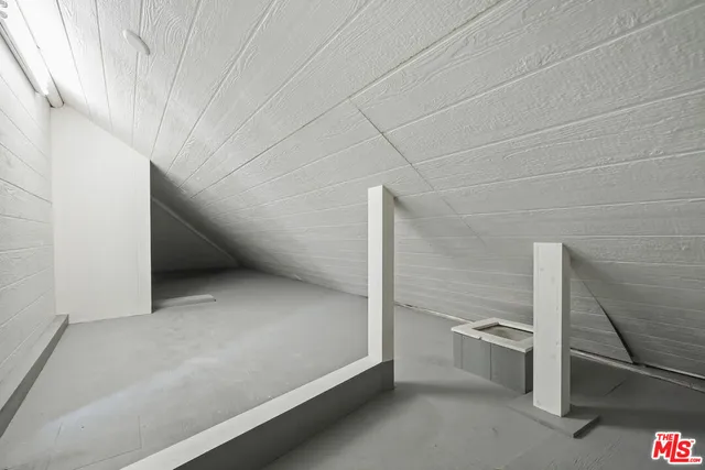 a view of a bench in a garden