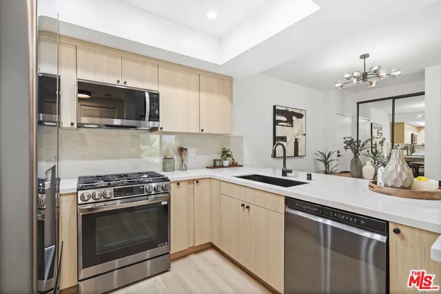 a en suite bathroom with a sink and a mirror