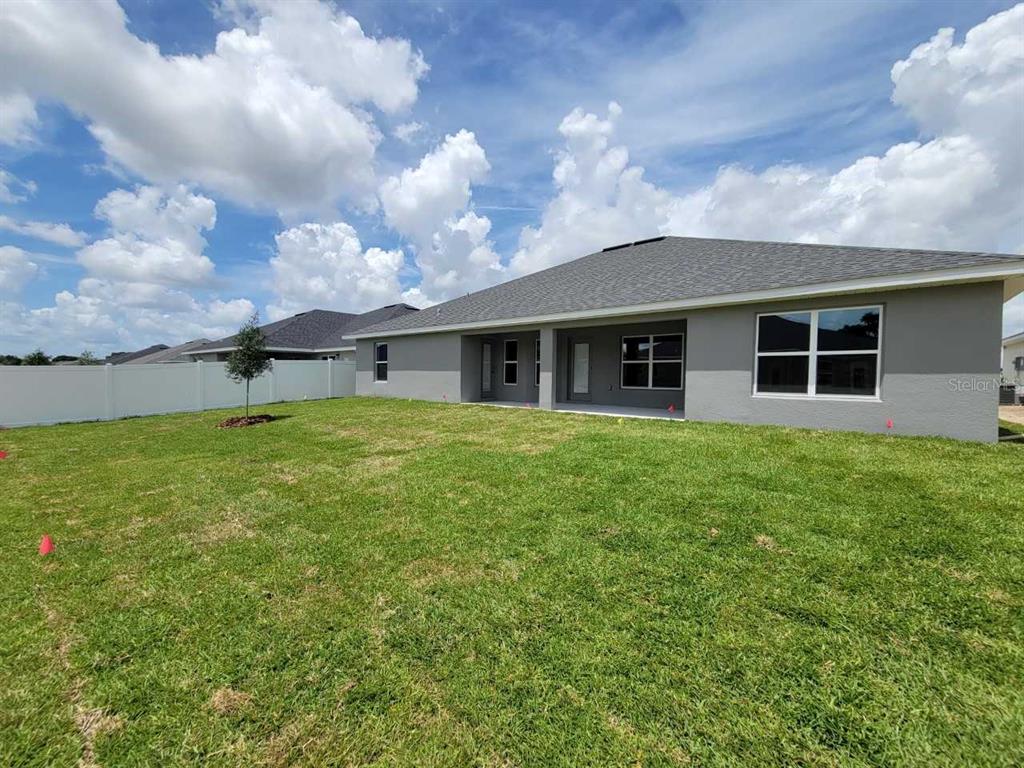 4626 Southwest 103rd Street Road Ocala, FL 34476 - Photo 29 of 29 a house view with a garden space