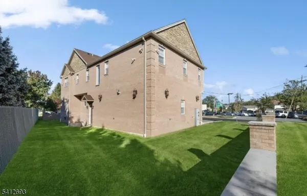 a view of a back yard of the house