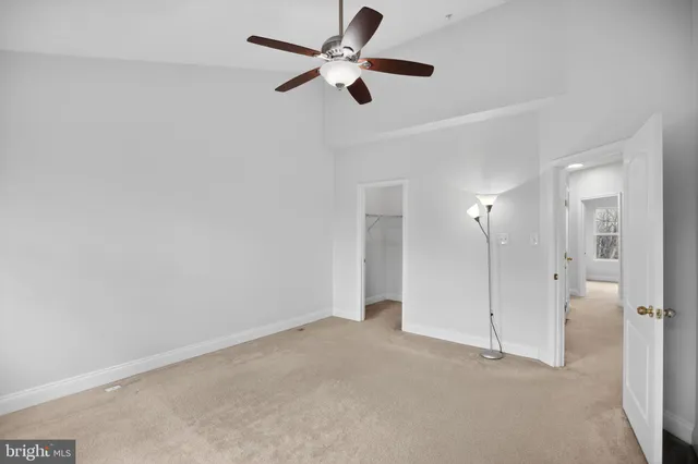 a bathroom with a double vanity sink mirror and shower