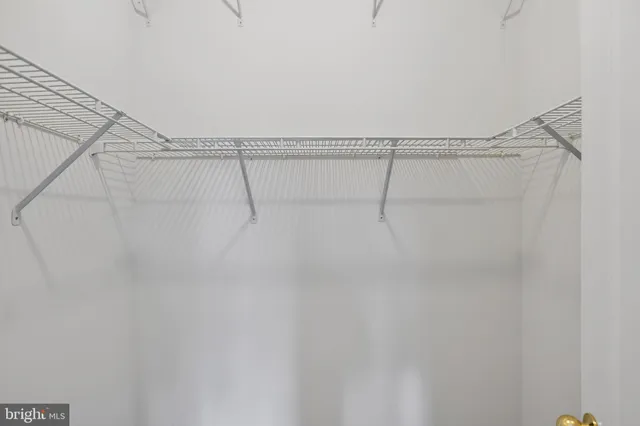 a bathroom with a sink double vanity and a mirror