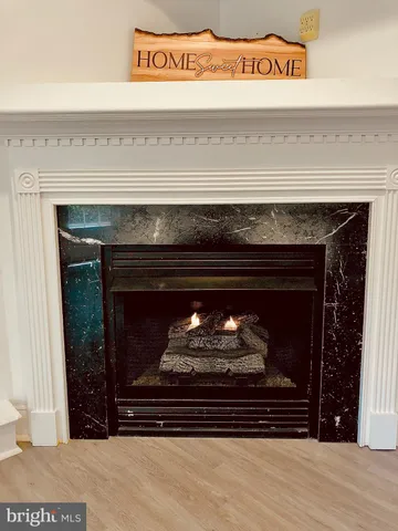 a fireplace with a clock on top of it