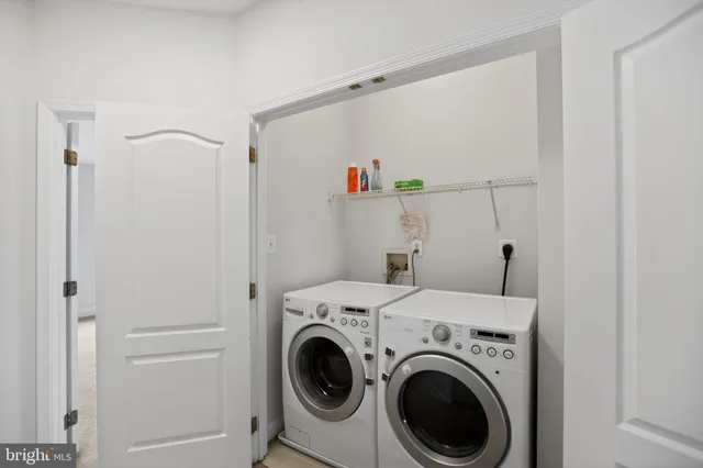 a view of a balcony with chairs