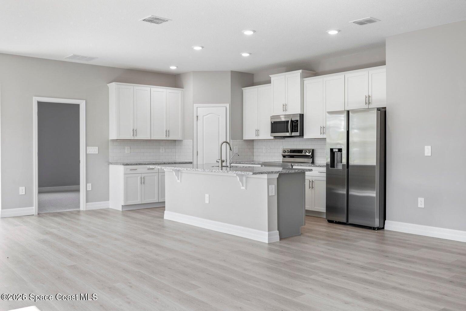 495 Harrison Street Southwest Palm Bay, FL 32908 - Photo 2 of 28 20250331150047894171000000-o