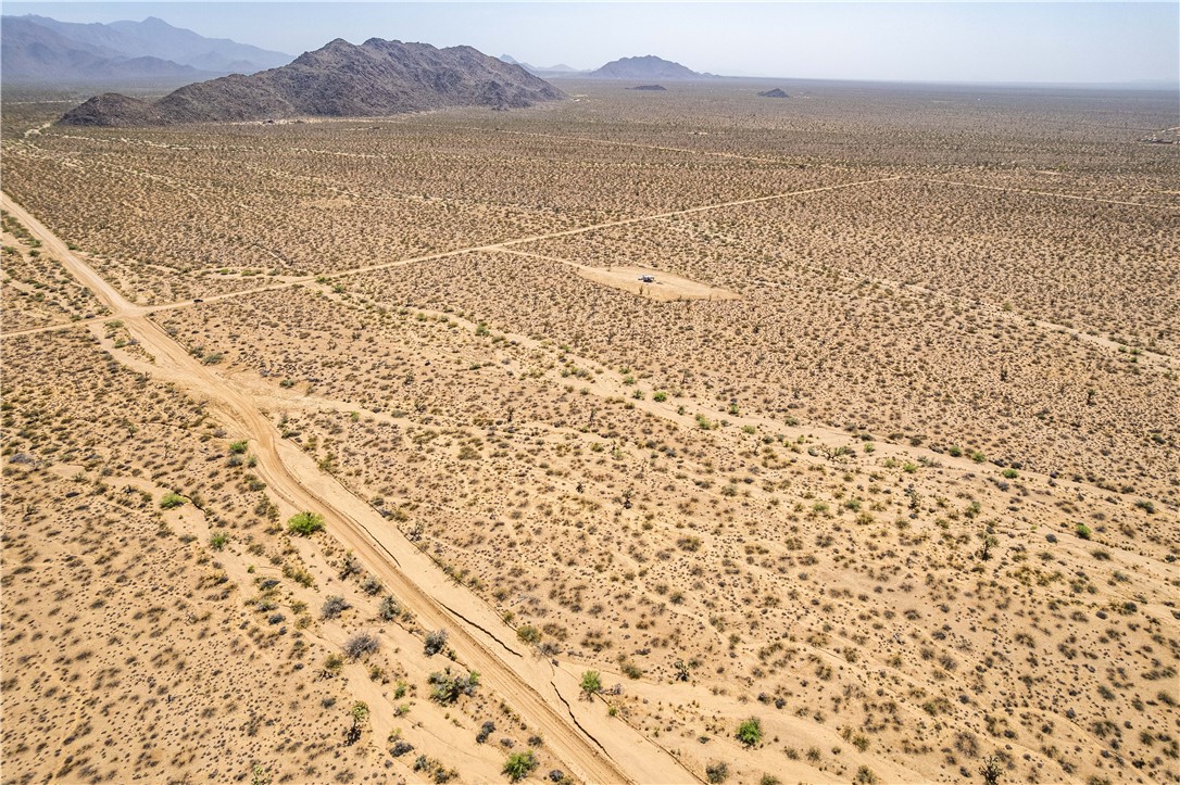 0 East Arroyo Road Yucca, AZ 86438 - Photo 7 of 25 Expansive desert landscape with scattered vegetation