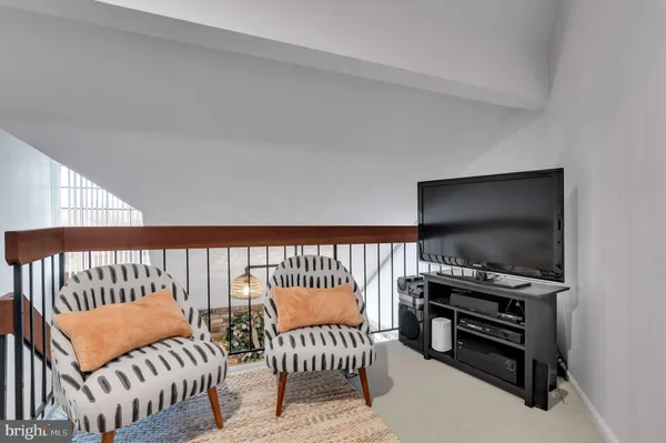 a kitchen with stainless steel appliances granite countertop a refrigerator and microwave