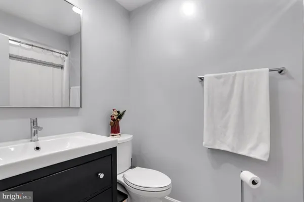 a view of a hallway with washer and dryer