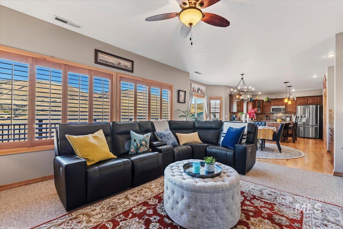 11660 Timber Butte Road Sweet, ID 83670 - Photo 10 of 49 Open-concept living area with a wood-finish ceiling fan and recessed lighting