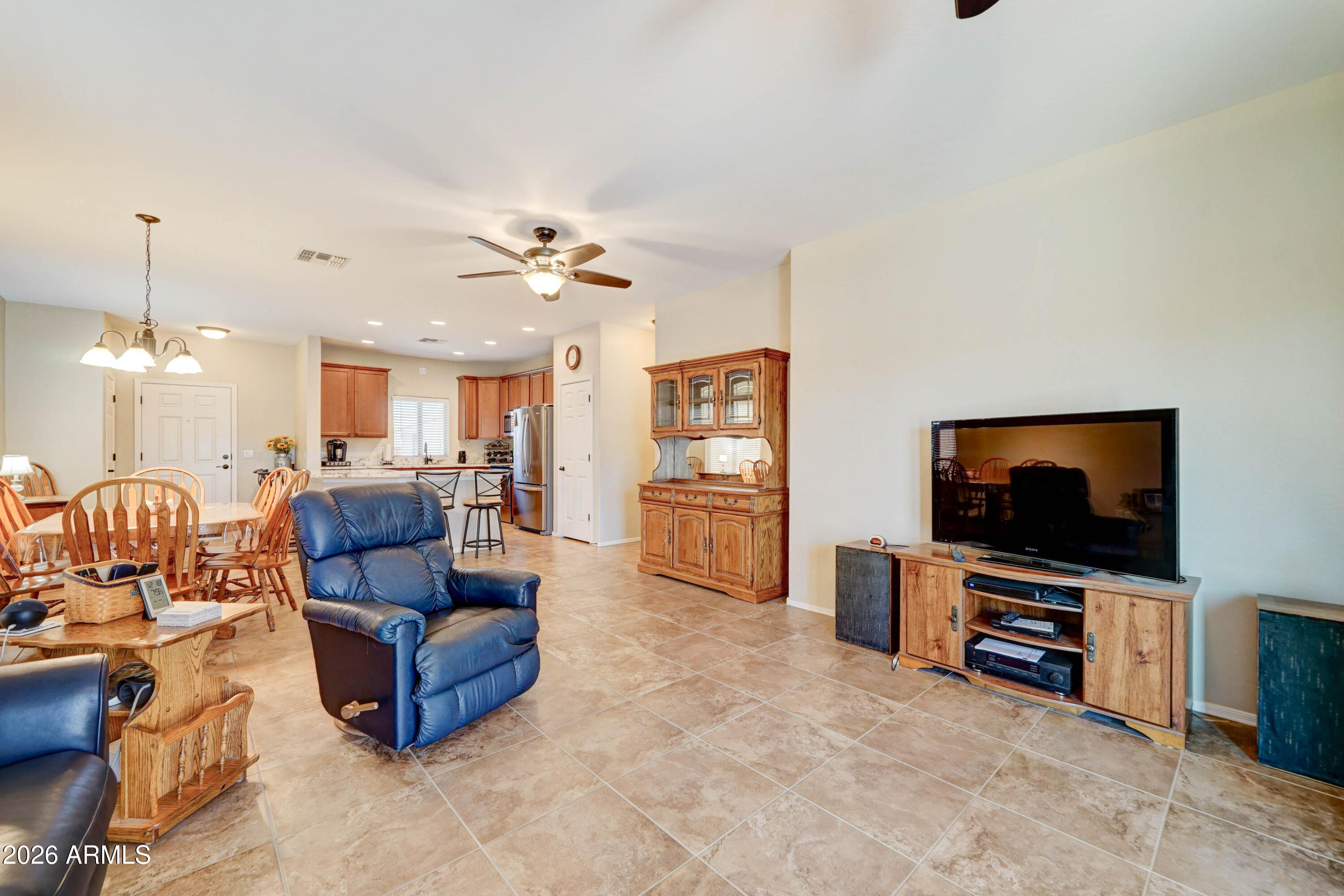 2101 South Meridian Road, Unit 164 Apache Junction, AZ 85120 - Photo 11 of 56 a living room with furniture and a flat screen tv