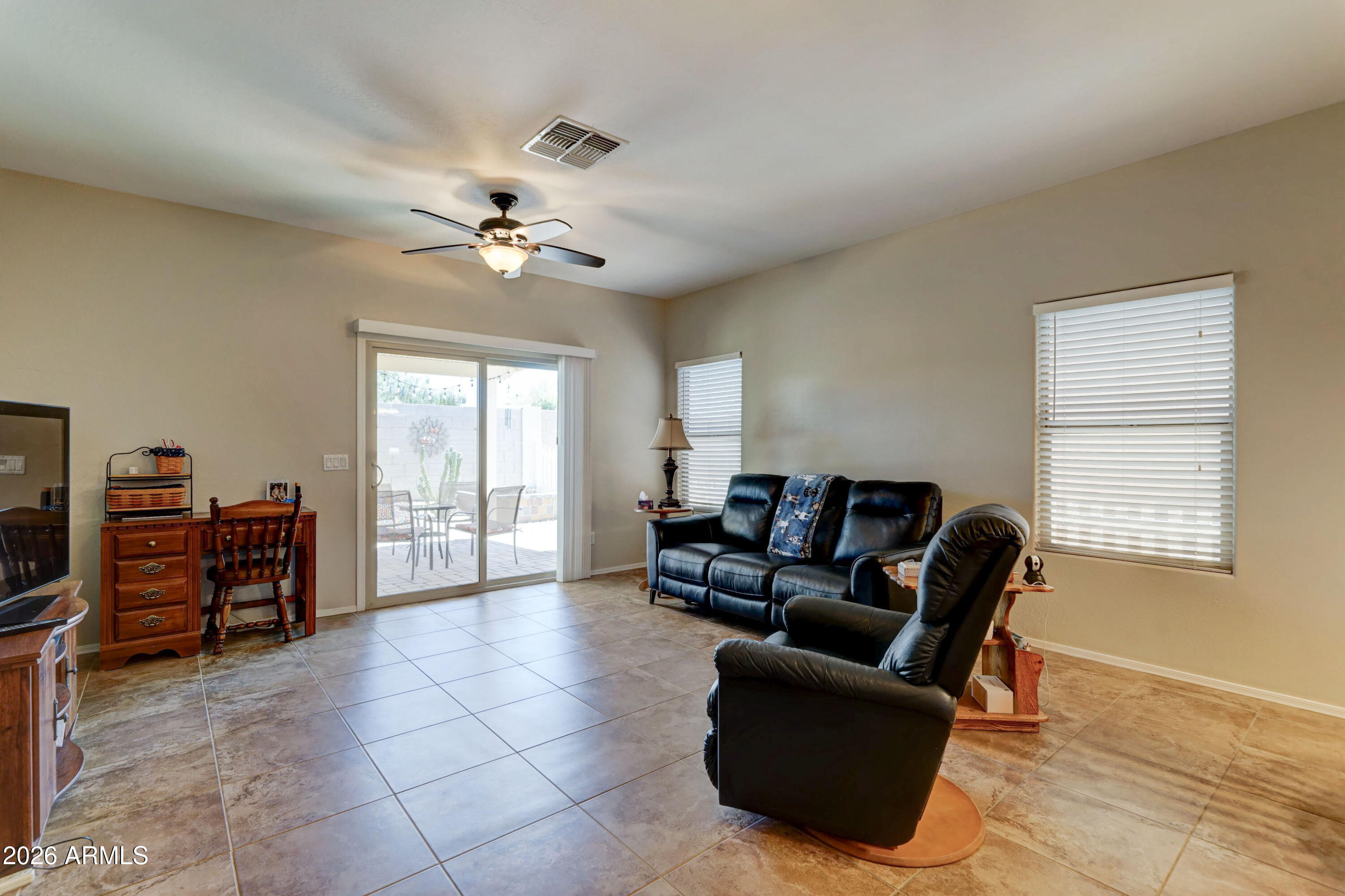 2101 South Meridian Road, Unit 164 Apache Junction, AZ 85120 - Photo 8 of 56 a living room with furniture and a window