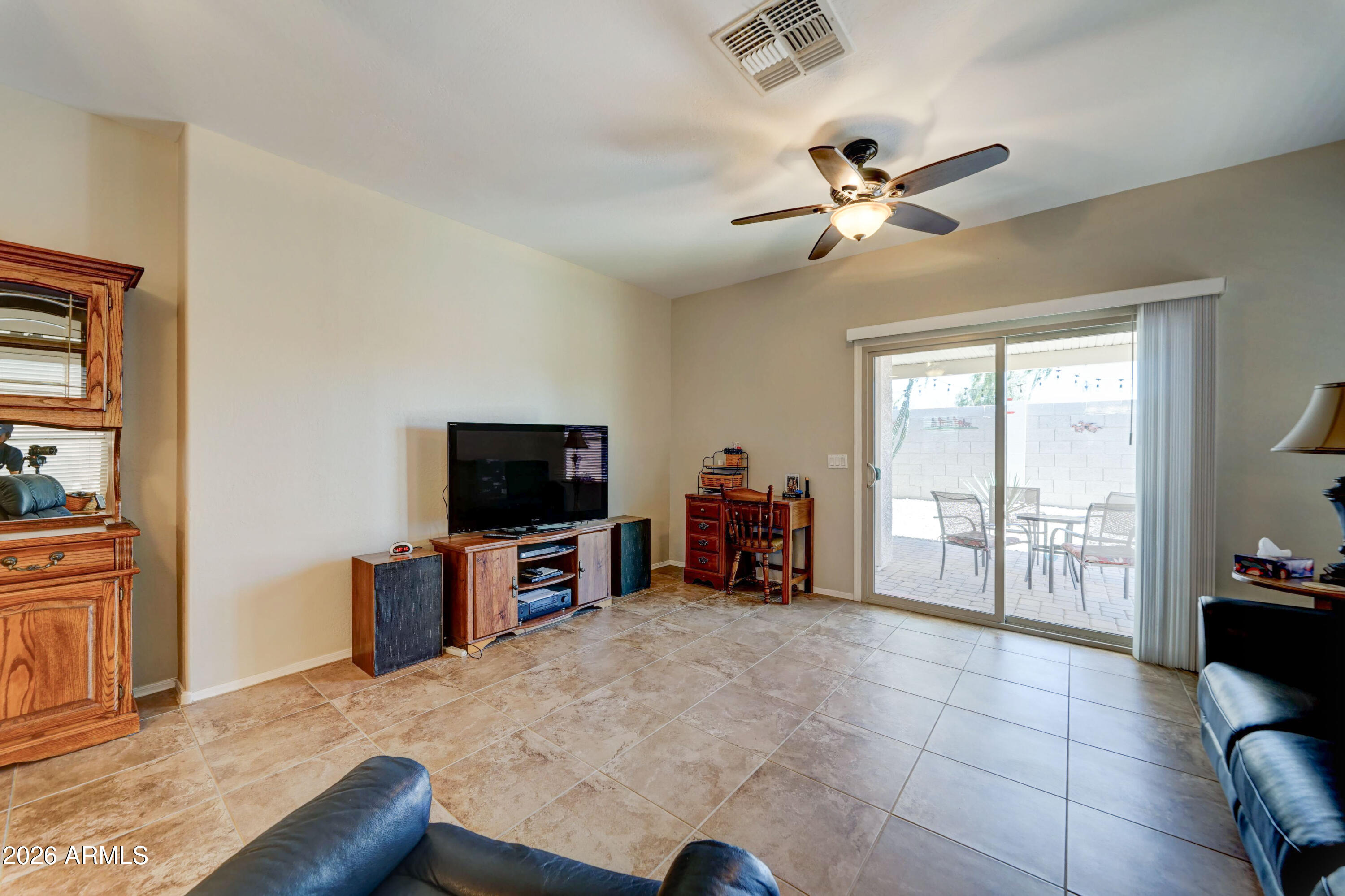 2101 South Meridian Road, Unit 164 Apache Junction, AZ 85120 - Photo 9 of 56 a view of a livingroom with furniture workspace and a window