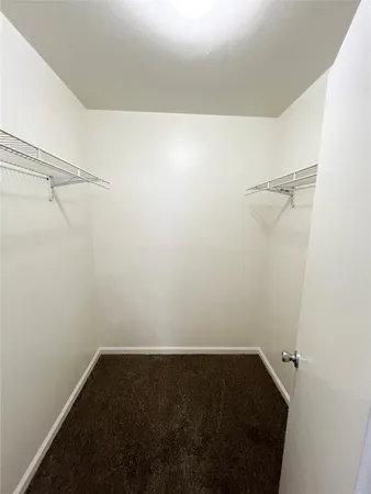 a view of small space with racks on the wall