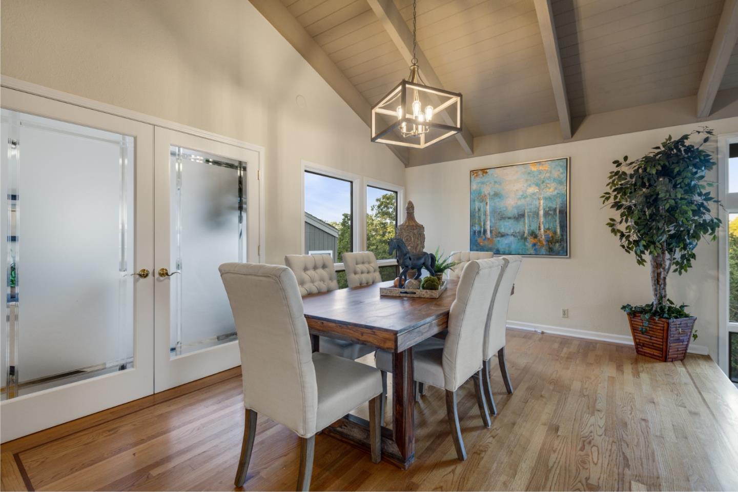 15076 Elm Park Monte Sereno, CA 95030 - Photo 11 of 68 a view of a dining room with furniture wooden floor and chandelier